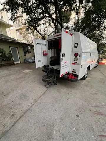 Magnet Plumbing service vehicle on-site for Grease Trap Cleaning in Sunrise Estates